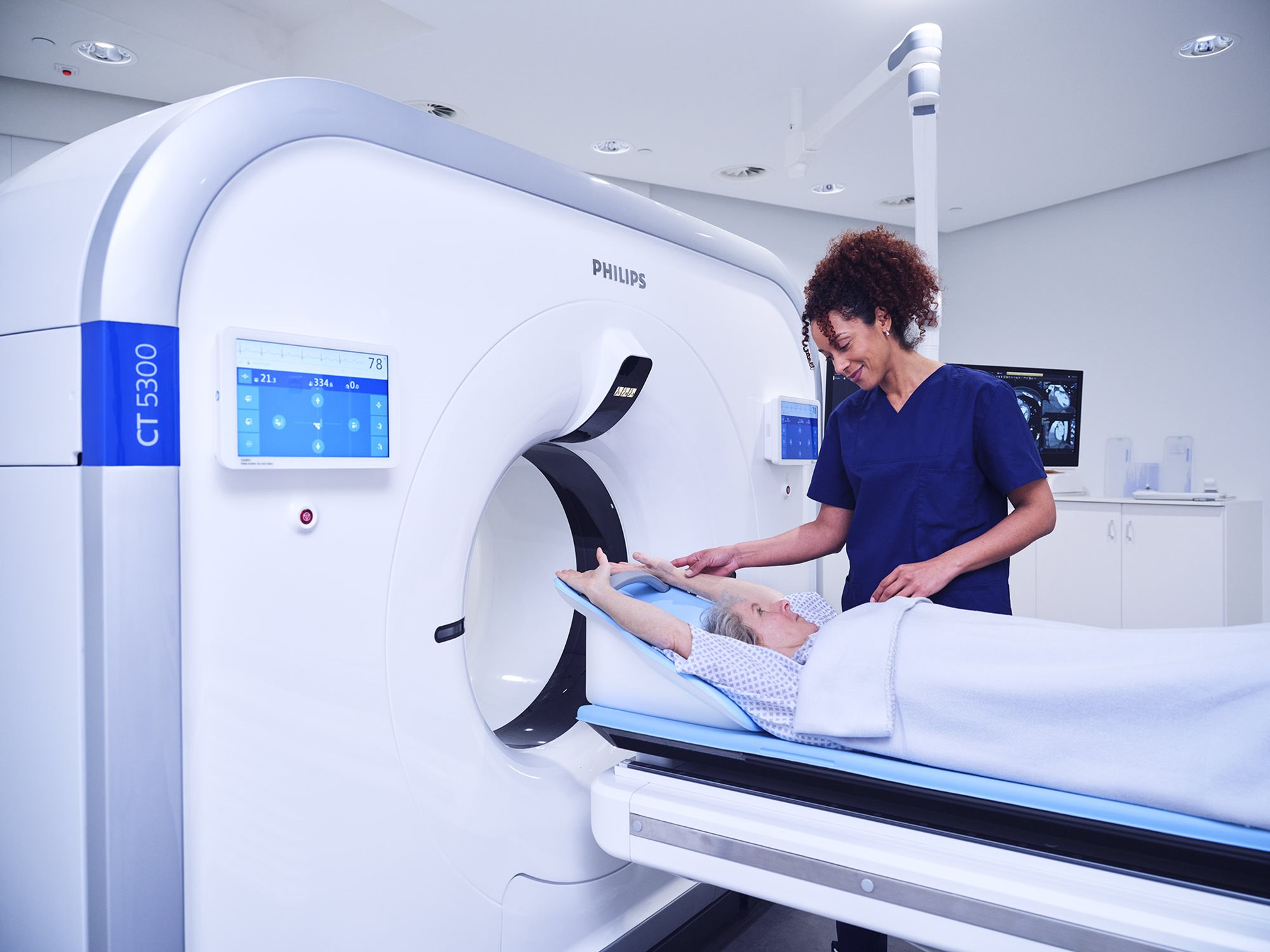 Patient and provider using MRI machine