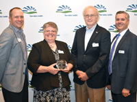 Rural Wisconsin Health Cooperative director of advocacy Jeremy Levin, nursing leadership senior manager Cella Janisch-Hartline, RN, BSN, executive director Tim Size and NRHA CEO Alan Morgan